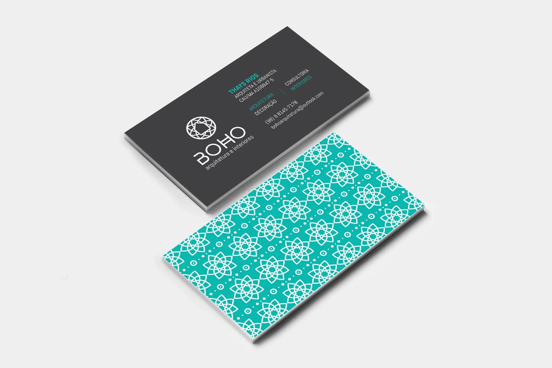BOHO business cards: dark grey front with white logo and contact details, teal back with a geometric floral pattern